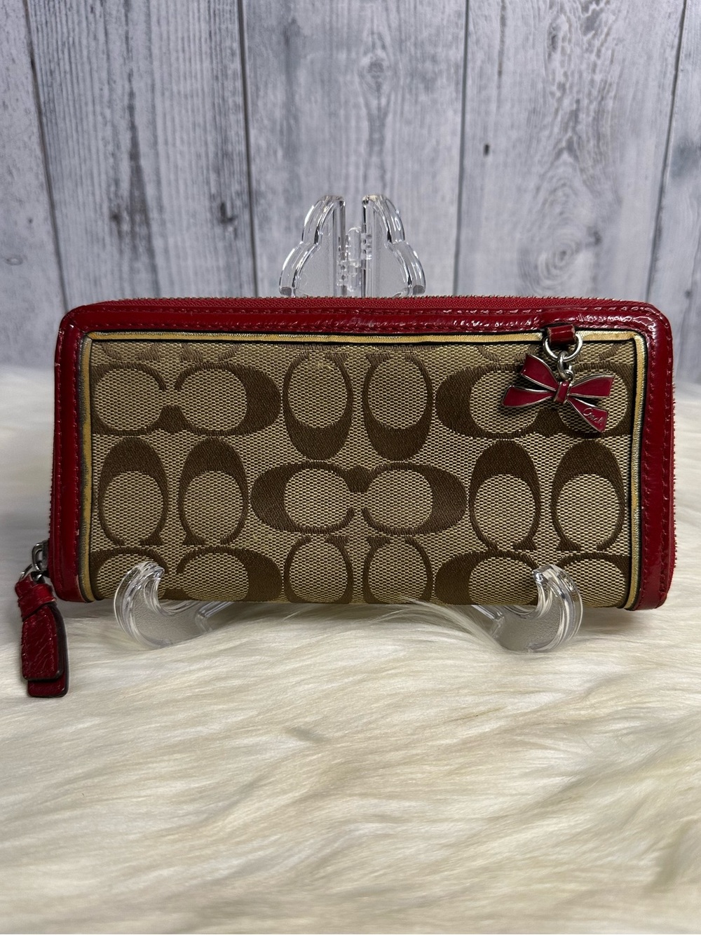 Coach Brown Signature Canvas Zip Wallet with Red Trim and Bow Charm
